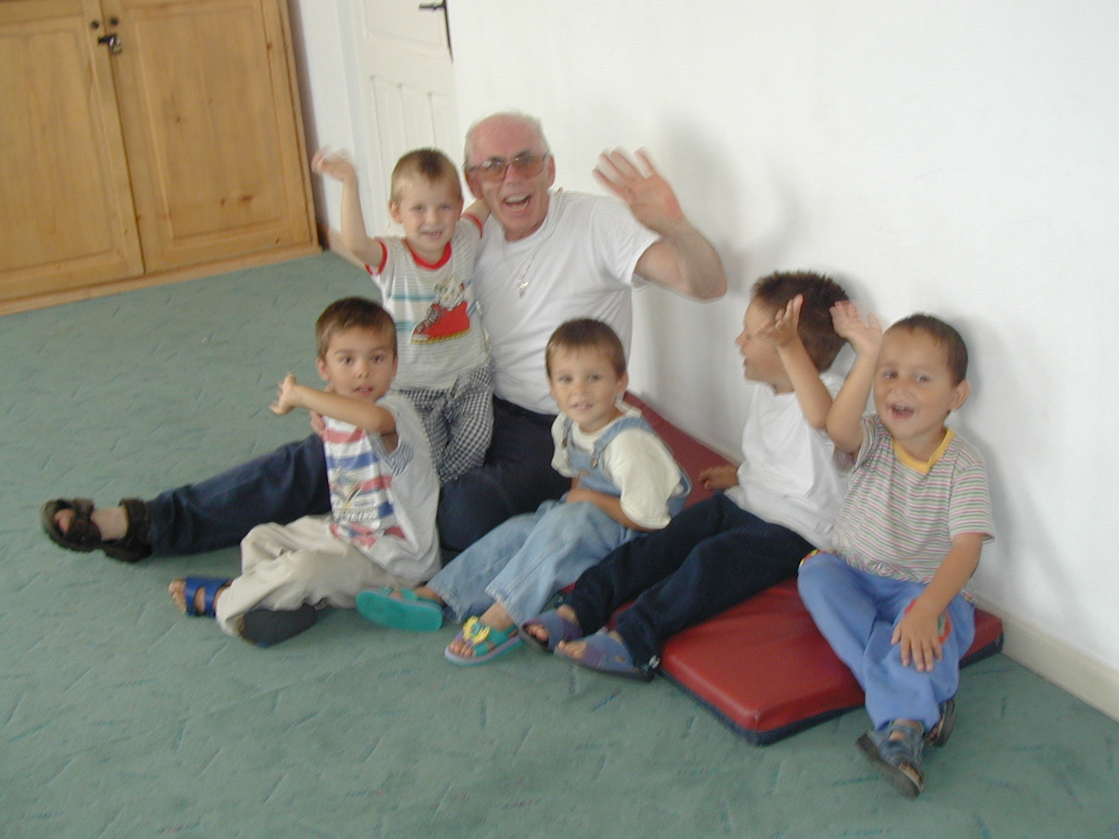 Fr. John with children in the playroom at Bistritia.